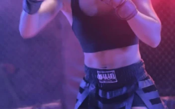Stock Video Female Fighter Preparing For A Match In A Ring For PC