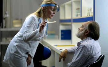 Stock Video Female Doctor Doing A Medical Checkup To A Man For PC