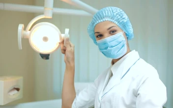 Stock Video Female Dentist Wearing Mask Portrait For PC