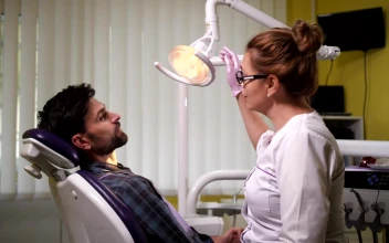 Stock Video Female Dentist Checking Her Patient For PC