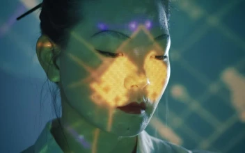 Stock Video Female Cyborg Facing Down For PC