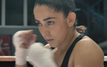 Stock Video Female Boxer Training On The Ring For PC