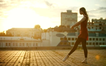 Stock Video Female Ballet Dancer Taking A Leap At Sunset For PC
