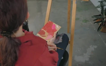 Stock Video Female Artist Painting A Picture In A Workshop For PC