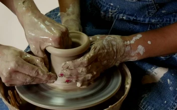 Stock Video Female And Male Hands Working Together On Raw Clay For PC