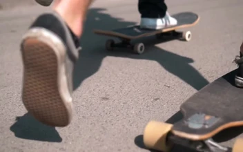 Stock Video Feet Of Skateboarders On The Street Tracking Shot For PC