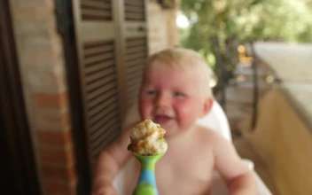 Stock Video Feeding A Baby Outside For PC