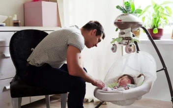 Stock Video Father Watching His Newborn Child Sleep For PC