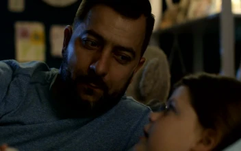 Stock Video Father Telling A Bedtime Story To His Daughter For PC