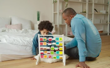 Stock Video Father And Son With A Didactic Toy For PC