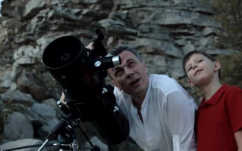Stock Video Father And Son Using Telescope For PC