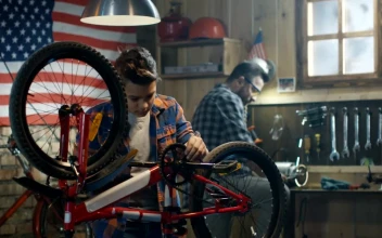 Stock Video Father And Son Repairing A Bike In The Garage For PC