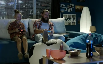 Stock Video Father And Son Having Fun Playing Video Games For PC