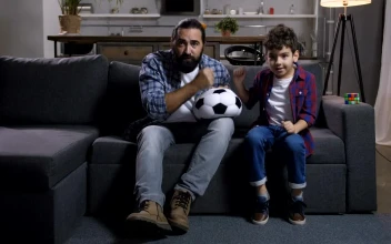 Stock Video Father And Son Enjoying Football For PC