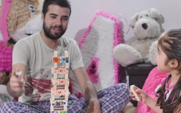 Stock Video Father And Daughter Playing Fun Making A Tower With Chips For PC