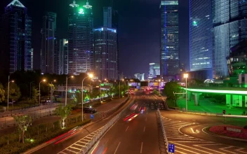 Stock Video Fast Traffic On A Shanghai Road At Night For PC