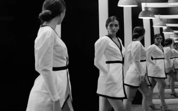 Stock Video Fashion Model In Front Of Multiple Mirrors For PC