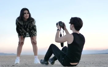 Stock Video Fashion Girl Posing For A Photographer In A Desert For PC
