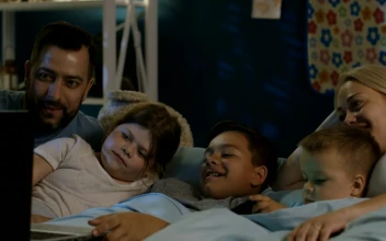 Stock Video Family Watching Laptop At Night For PC