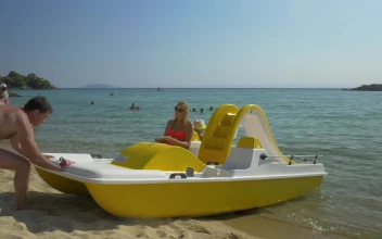 Stock Video Family Taking A Pedal Boat Out For PC