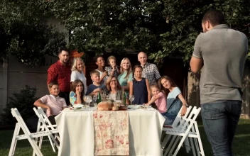 Stock Video Family Taking A Group Photo In The Garden For PC