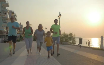 Stock Video Family Running By The Waterfront For PC
