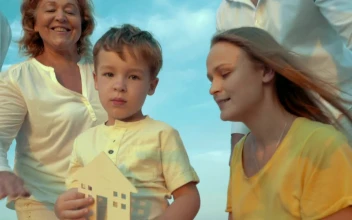 Stock Video Family Holding A Wooden House For PC
