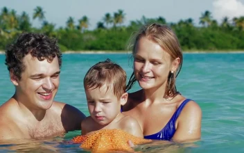 Stock Video Family Holding A Starfish For PC