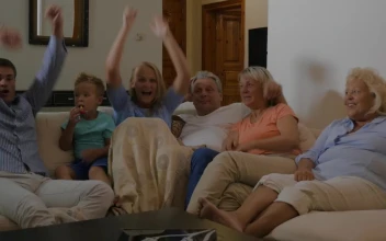 Stock Video Family Celebrating A Goal On Tv For PC