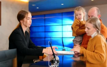 Stock Video Family At A Hotel Reception Checking In For PC