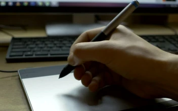 Stock Video Hand Working On A Graphic Tablet For PC