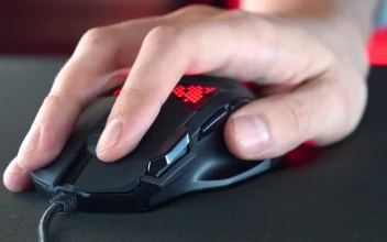 Stock Video Hand Using A Gaming Mouse With Rgb Neon Lightings For PC