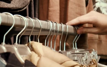 Stock Video Hand Selecting Through Clothes For PC