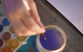 Stock Video Hand Of A Woman Painting With Watercolors For PC