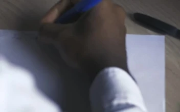 Stock Video Hand Of A Man Writing On A Sheet On A For PC