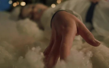 Stock Video Hand Of A Girl Laying On Cotton Wool At Christmas For PC
