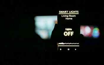 Stock Video Hand Holds Mobile App Showing Future Smart Home Features For PC