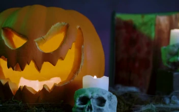 Stock Video Halloween Pumpkin With Cobwebs Candles Gravestones And Smoke Around For PC
