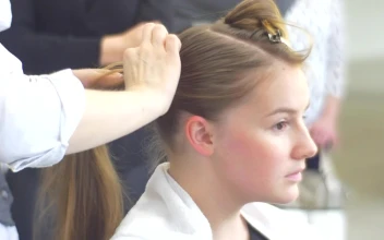 Stock Video Hairstylist Working On A Blonde Womans Hair For PC