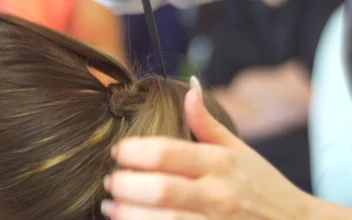 Stock Video Hairstylist Hands Working On Womans Hair For PC