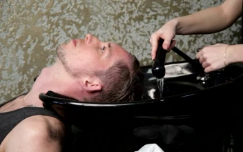 Stock Video Hairdresser Washing A Mans Hair For PC