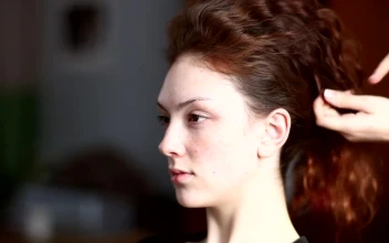 Stock Video Hair Styler Working On A Womans Hair For PC
