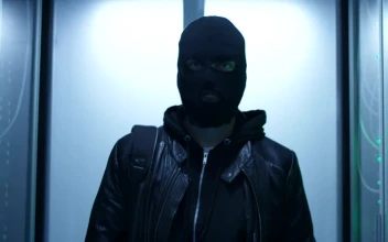 Stock Video Hacker With Face Mask Entering Data Center For PC