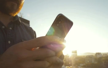 Stock Video Guy Texting At Sunset For PC