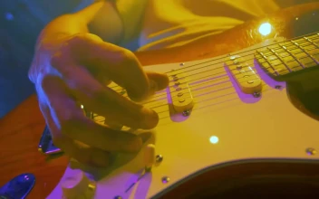 Stock Video Guitarist Plays And Moves His Electric Guitar For PC