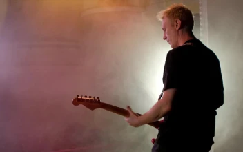 Stock Video Guitarist Playing Guitar On A Smoky Stage For PC
