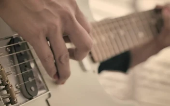 Stock Video Guitar Being Played By Hands With Painted Nails For PC