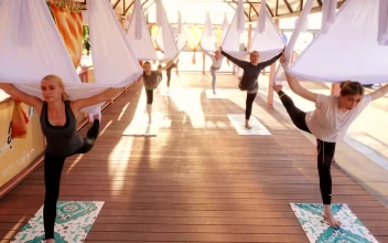 Stock Video Group Of Women Practicing Yoga In The Morning For PC