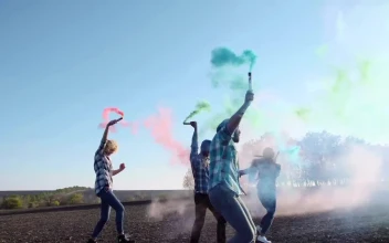 Stock Video Group Of Friends With Colored Smoke Grenades For PC