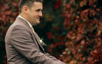 Stock Video Groom And Bride Kiss After Their Wedding Party For PC